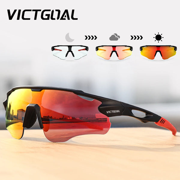 A pair of orange photochromic sports sunglasses resting on a wooden surface, shown alongside different tint options.