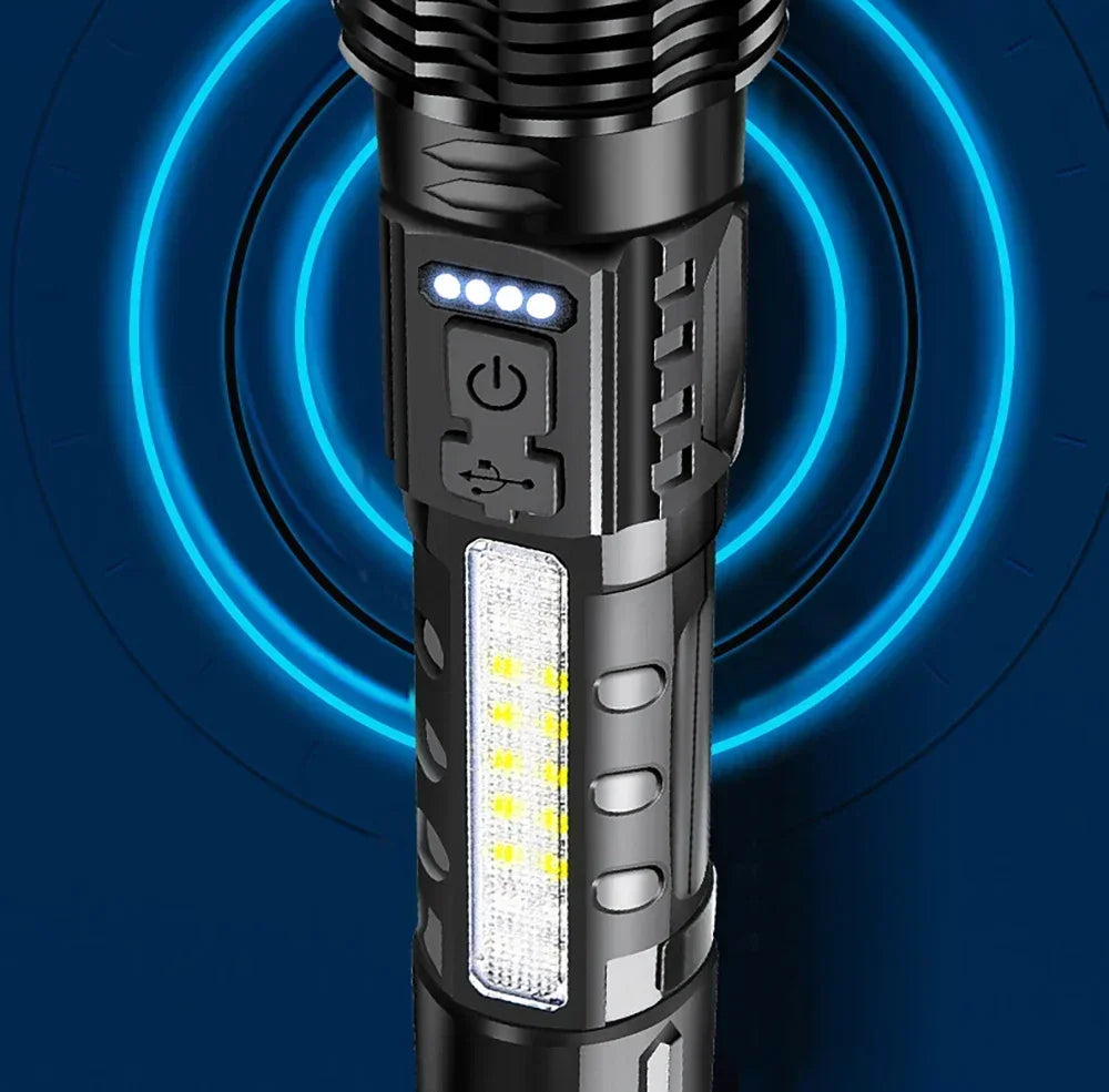 A close-up view of a black tactical LED flashlight with an illuminated front and blue glowing rings in the background.