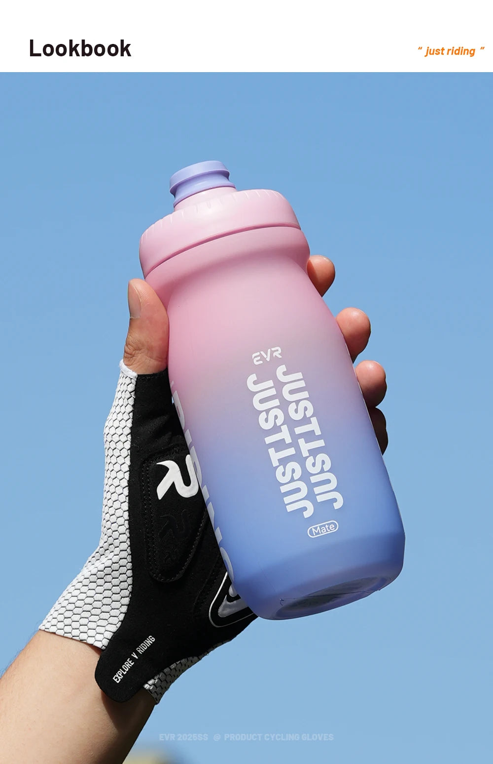 A hand holds a pink and purple squeezable cycling water bottle against a light blue sky.