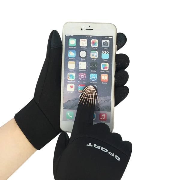 A hand wearing black sports gloves is holding a smartphone displaying an app interface.