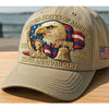 A beige adjustable baseball cap featuring a gold embroidered eagle over an American flag design for the 250th anniversary.