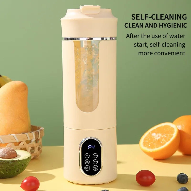 A beige portable electric juicer with a clear juice chamber and a digital display sits on a yellow surface.