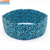 A black and teal leopard print women's sports headband shown flat.