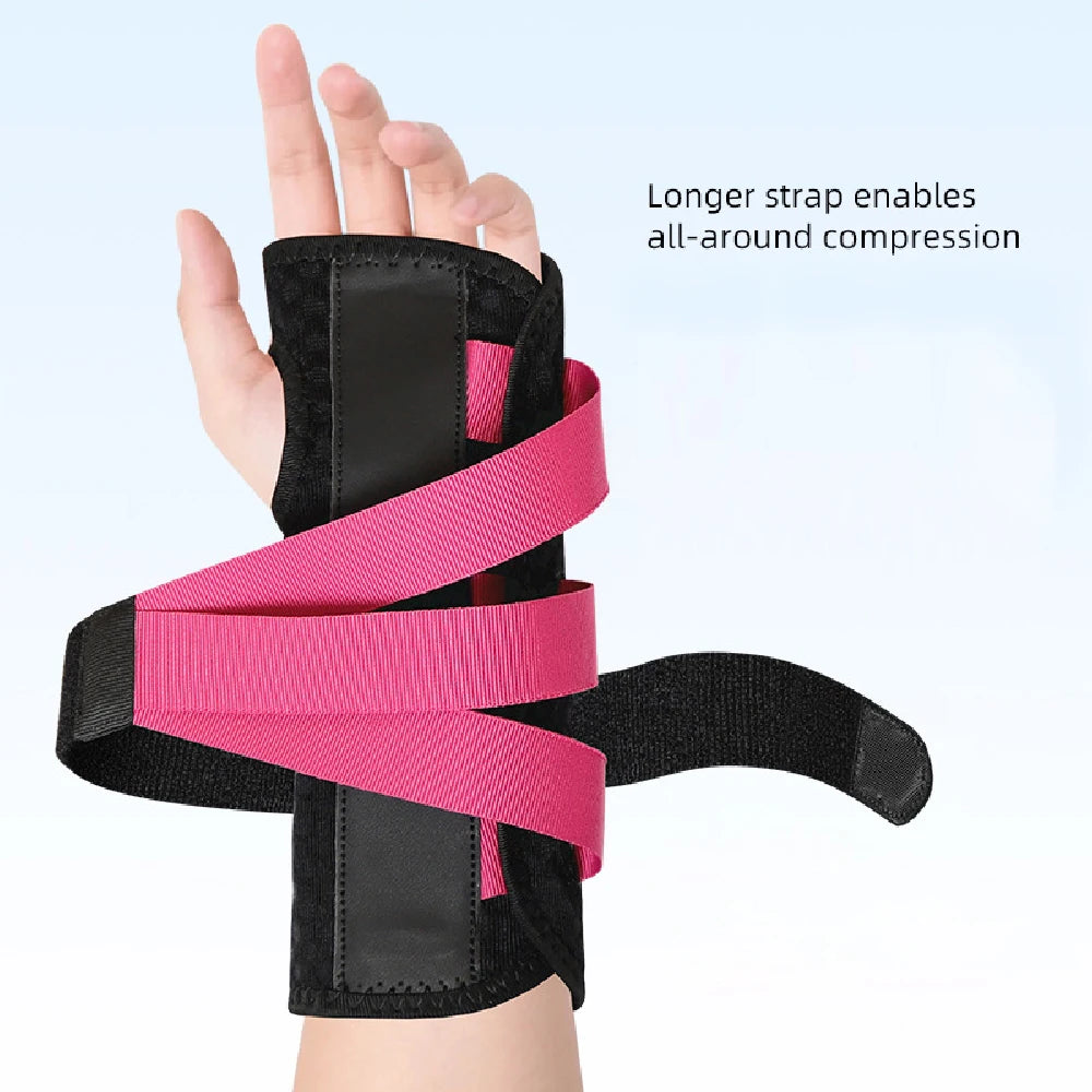 A hand wearing a black wrist brace with pink straps, demonstrating all-around compression.