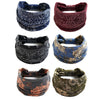 Four patterned bohemian cotton stretch headbands in navy, maroon, blue, and olive green.