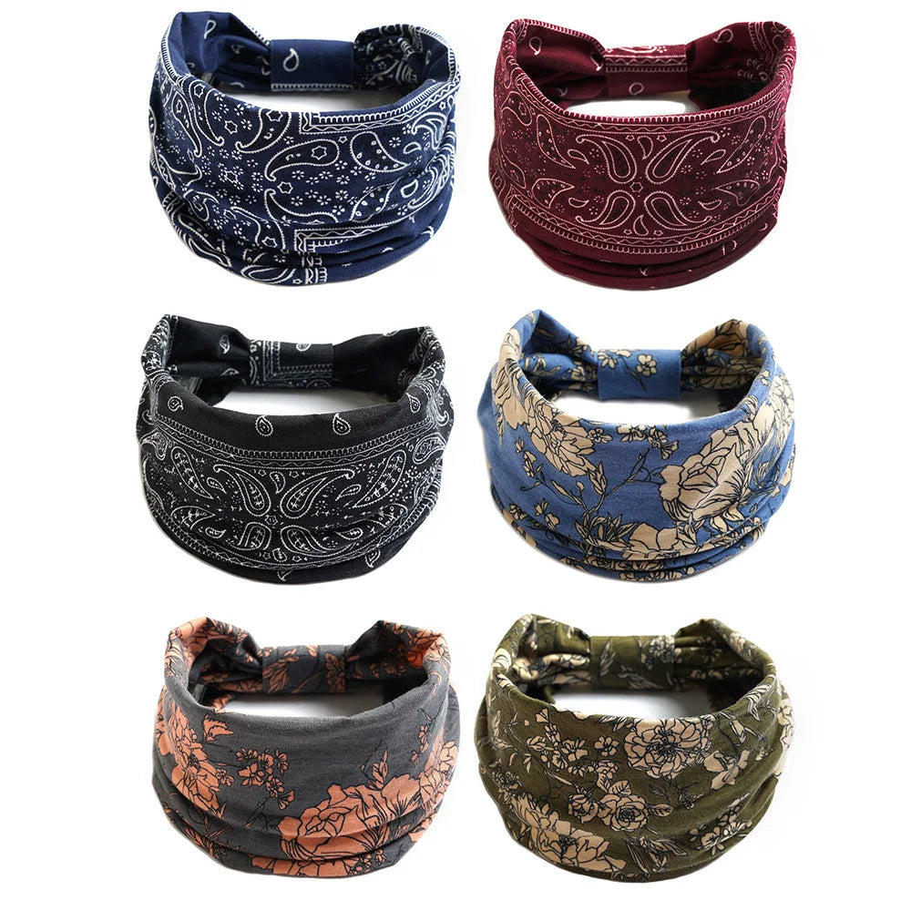 Four patterned bohemian cotton stretch headbands in navy, maroon, blue, and olive green.