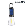 A black and blue USB rechargeable LED camping lantern with a clear glass bulb.