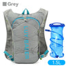 Grey LuzSacker backpack with blue accents and a 1.5L water bottle