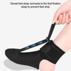 A black foot strap design showing a dorsal strap connecting to a foot fixation strap on a person's foot.