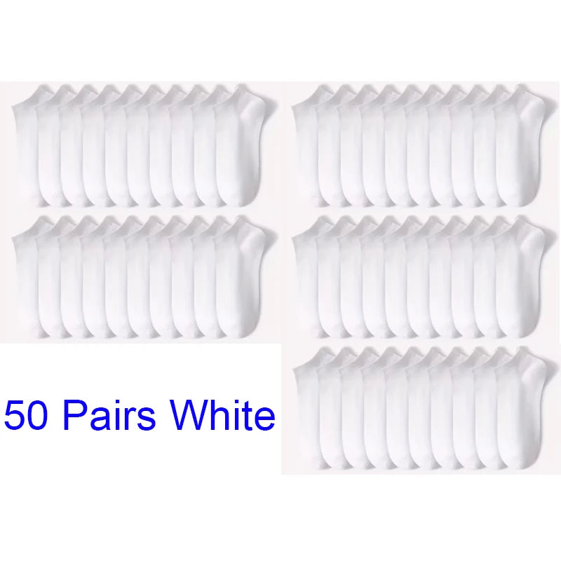 Fifty pairs of white comfort fit ankle socks arranged in multiple rows.