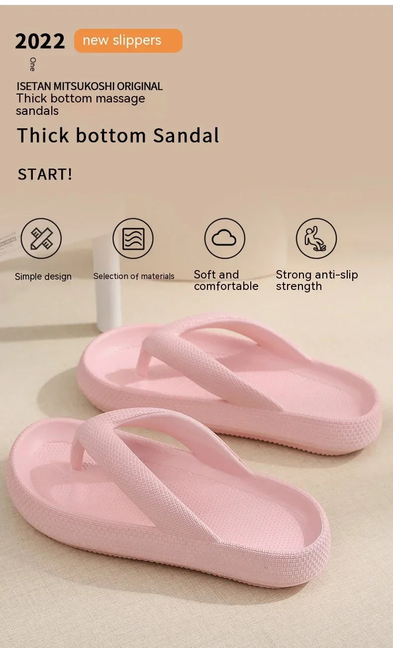 Pink Isetan Mitsukoshi original thick bottom massage sandals shown from the side and top view.
