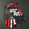 A set of black and red cycling gloves with a label showing features for durable off-road riding.