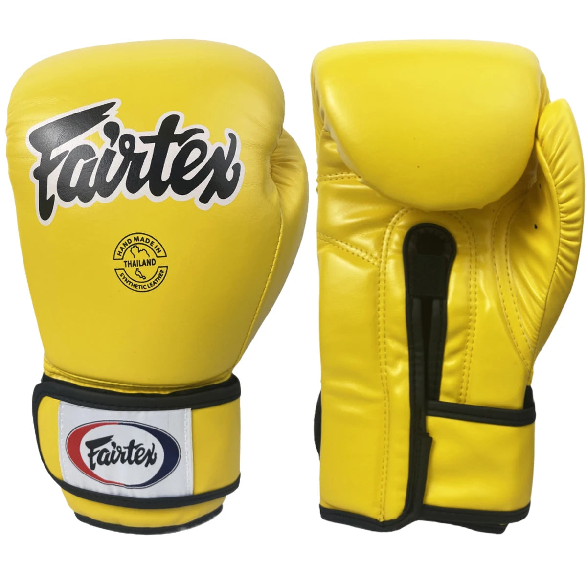 Ein Paar gelbe Lederboxhandschuhe mit schwarzer Beschriftung und Polsterung.