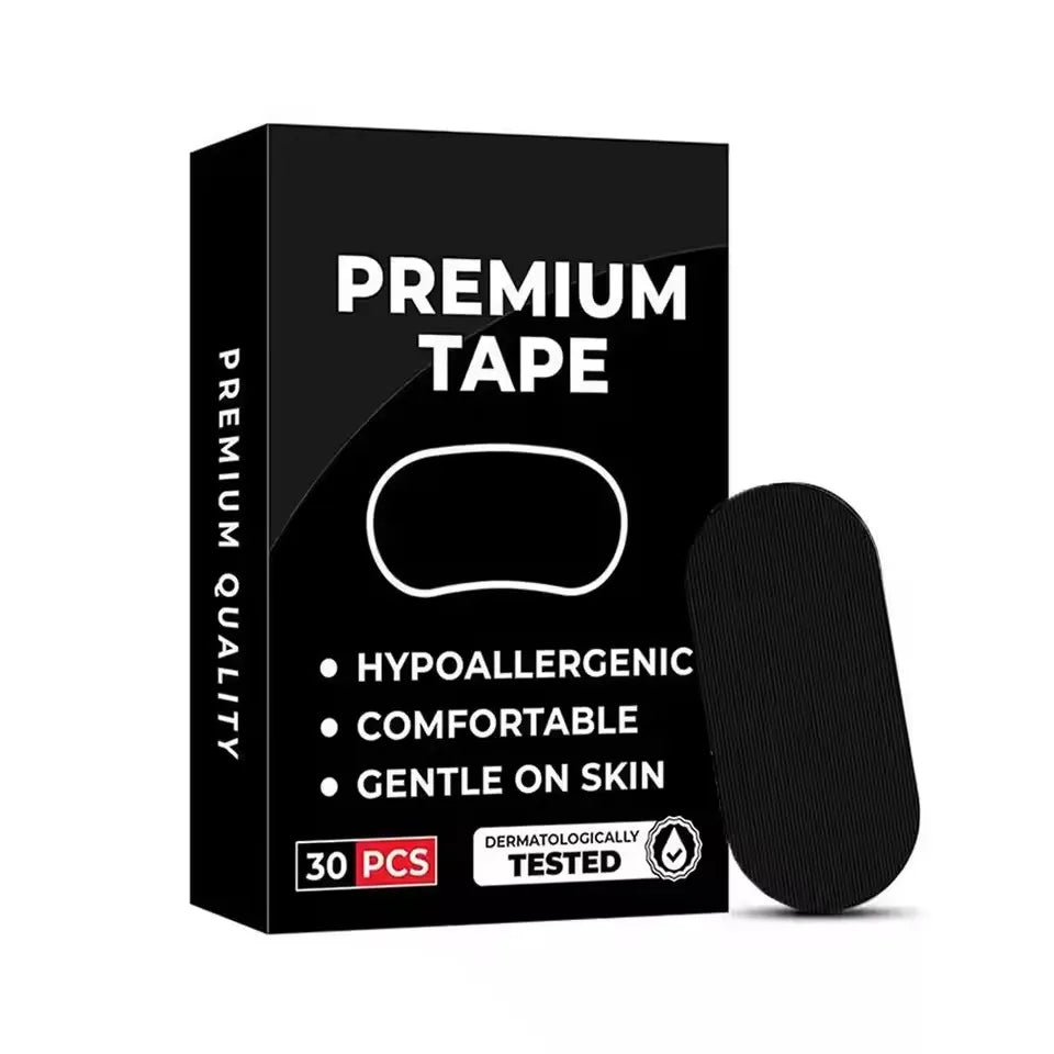 Emballage noir pour ruban de qualité supérieure, offrant des bénéfices hypoallergéniques et doux pour la peau.