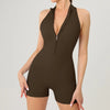 A model wearing a brown women's sexy backless fitness jumpsuit.