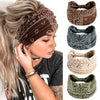 A woman wearing a brown bohemian cotton stretch headband and several other patterned headbands.