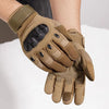 A close-up of tactical full finger gloves in olive green leather with a black mesh palm, worn on a hand.