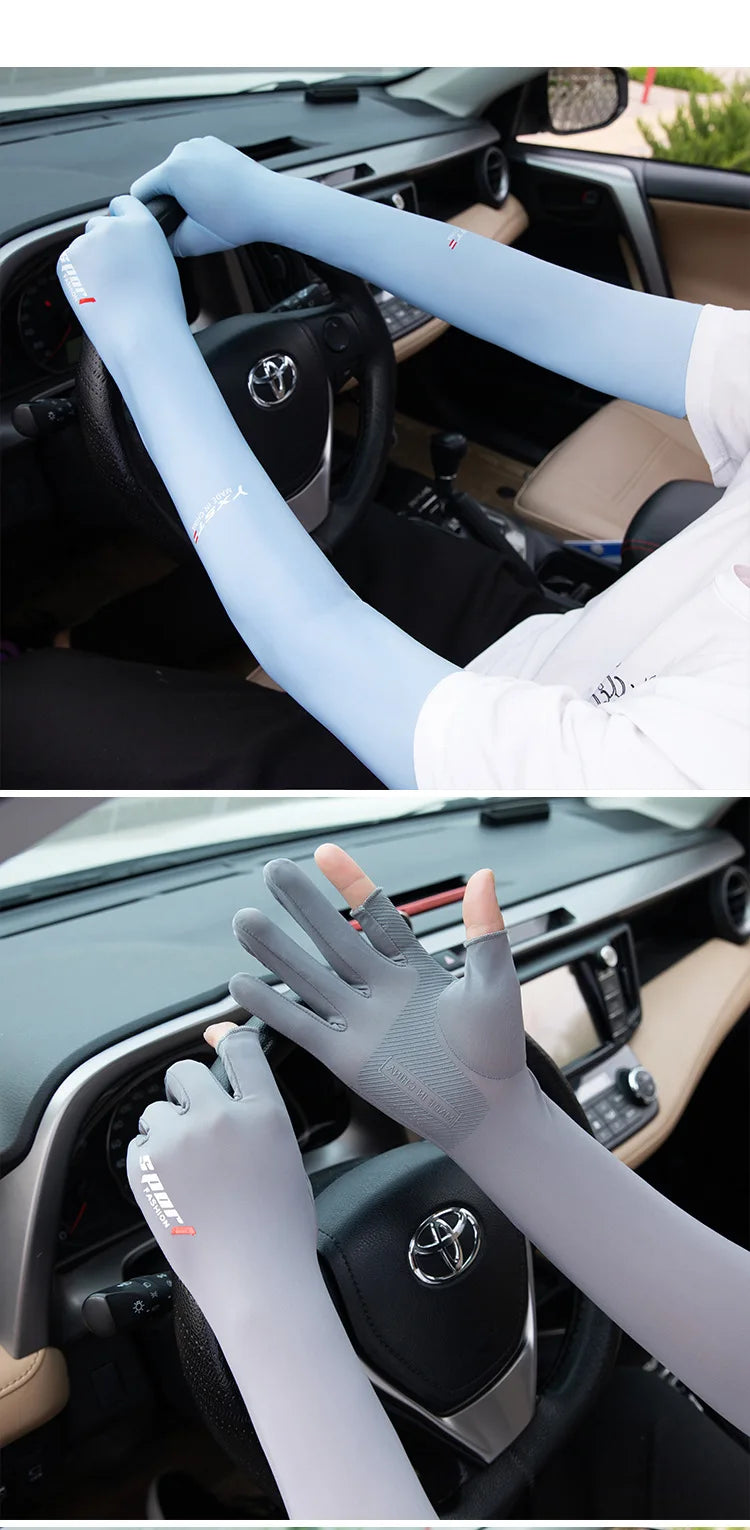 A person wearing light blue UV protection arm sleeves is shown in the driver's seat of a car.