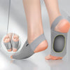 Gray silicone arch support insoles shown on a foot, demonstrating the fit and design.