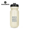 A beige sports water bottle with a black cap and the ROCKBROS logo visible on the body.