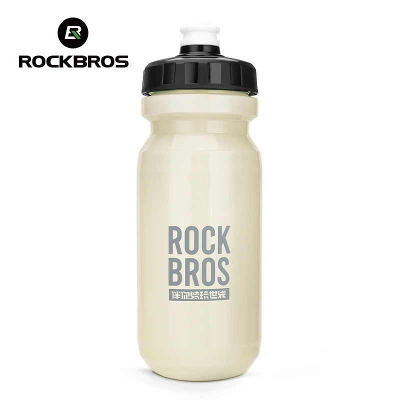 A beige sports water bottle with a black cap and the ROCKBROS logo visible on the body.