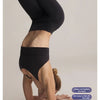 A model wearing black high elastic socks and leggings, demonstrating the fit and elasticity of the product.