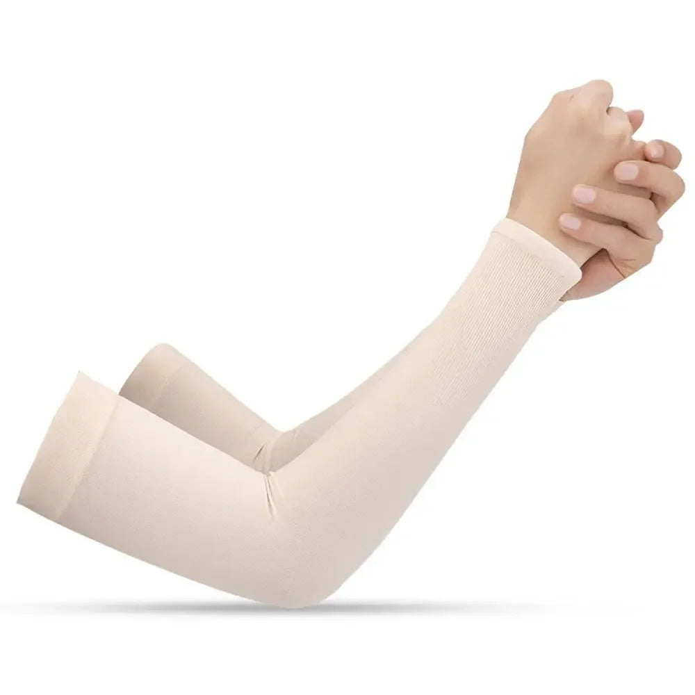 A person wearing light beige all-weather arm sleeves, showing the sleeve on an arm.