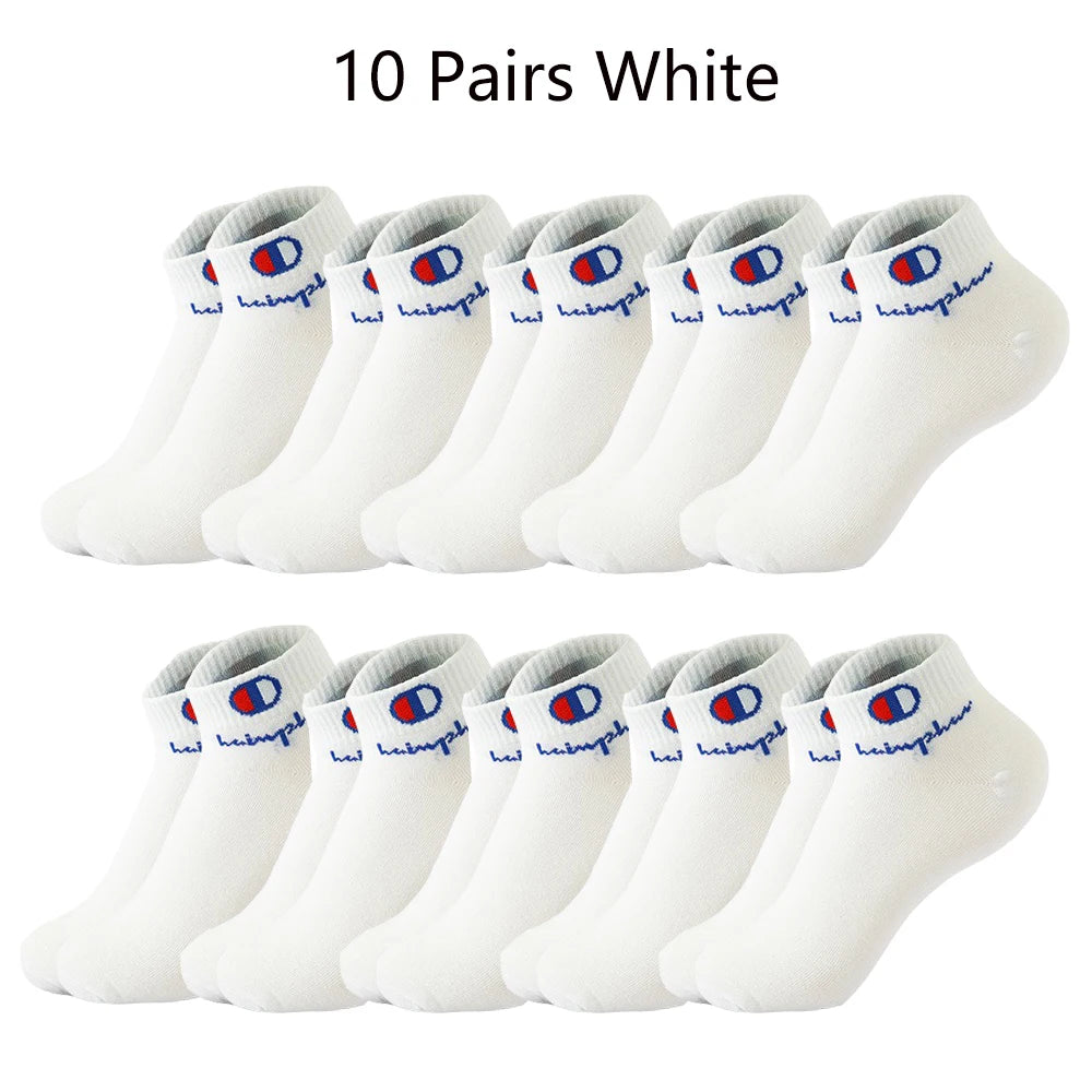 Ten pairs of white ankle socks displayed in a row.
