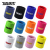A collection of colorful and textured sport wristbands in various colors including blue, red, green, orange, pink, and yellow
