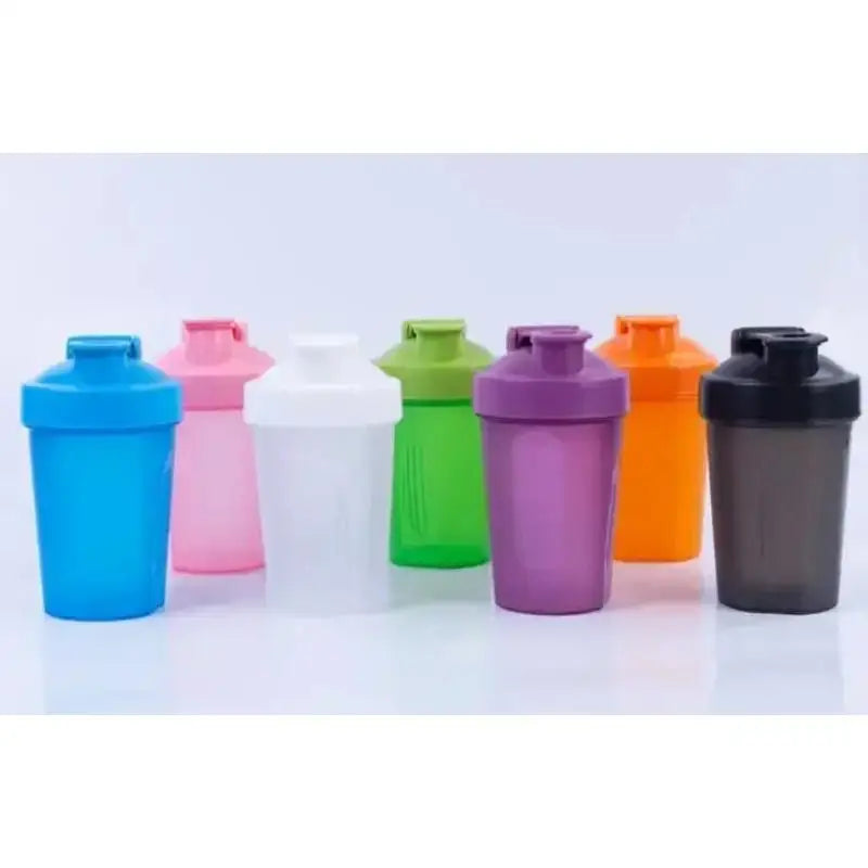 A collection of colorful leakproof protein shaker bottles in various shades including blue, pink, white, green, purple, and o