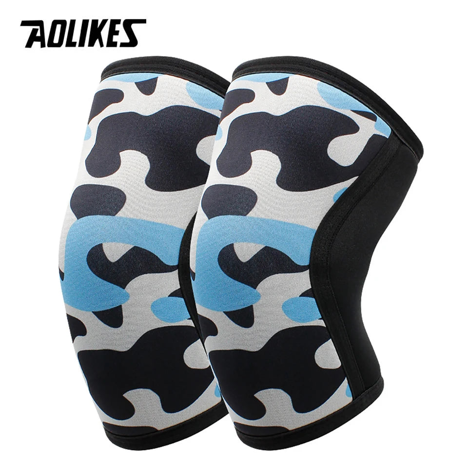 Pair of black and light blue camouflage knee sleeves for weightlifting