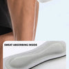 A close-up of a gray sweat absorbing knee strap being applied to a person's leg.