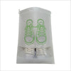 A clear non-woven shoe storage bag with a pair of sneakers visible inside.