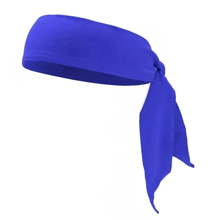 A royal blue breathable sports headband folded and displayed against a white background.