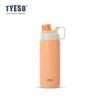 A light orange insulated stainless steel water bottle with a beige lid.