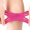 Pink kinesiology tape applied to the skin of a leg for joint support.