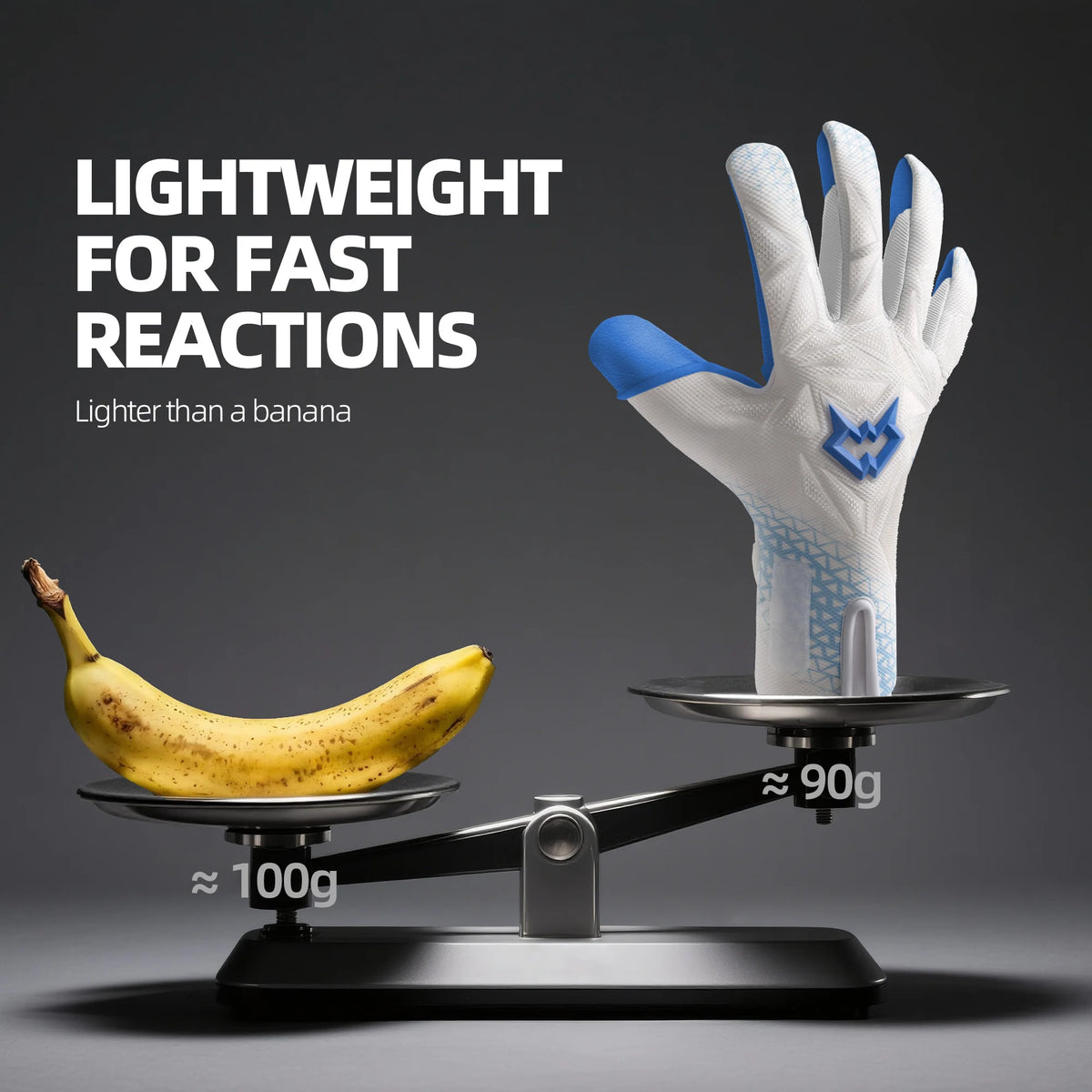 A pair of white goalkeeper gloves with blue accents is shown resting on a digital scale next to a banana.