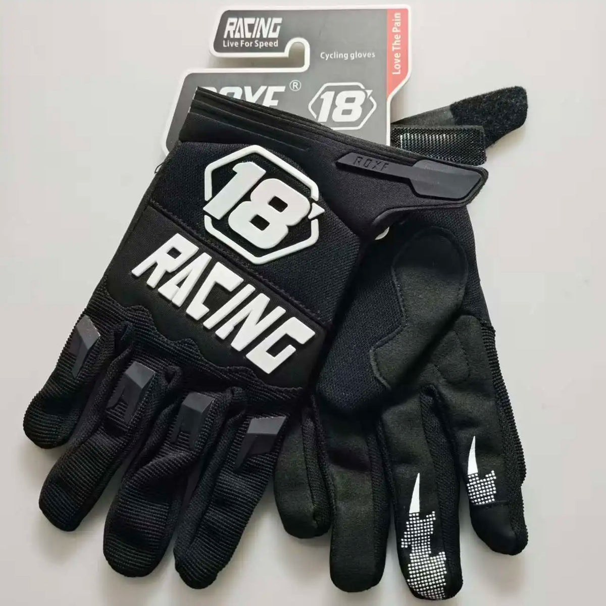 Black racing cycling gloves with a logo on the palm and fingers displayed on a white background.