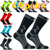A collection of eight pairs of black and gray compression cycling socks displayed in various colors and angles.
