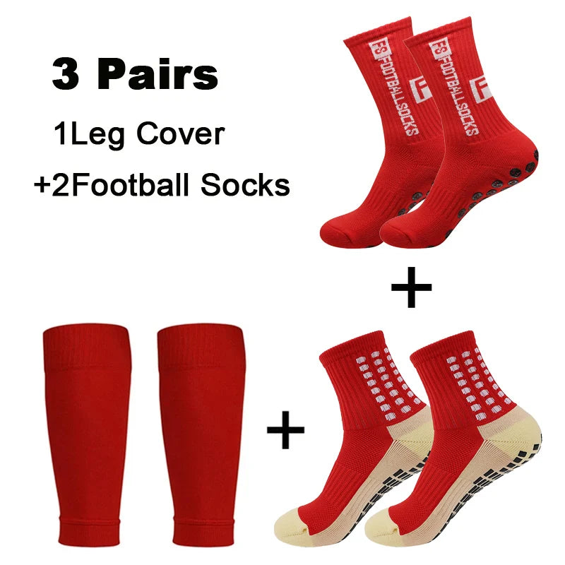 A set of three pairs of red football socks and one leg cover with accompanying knee pads.