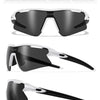A pair of black sunglasses with white accents shown from multiple angles.