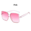 Pink vintage oversized retro sunglasses with pink tinted lenses