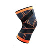 Black and orange breathable compression knee brace for sports and joint support
