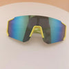 A pair of yellow-framed sports sunglasses with blue mirrored lenses resting on a white surface.
