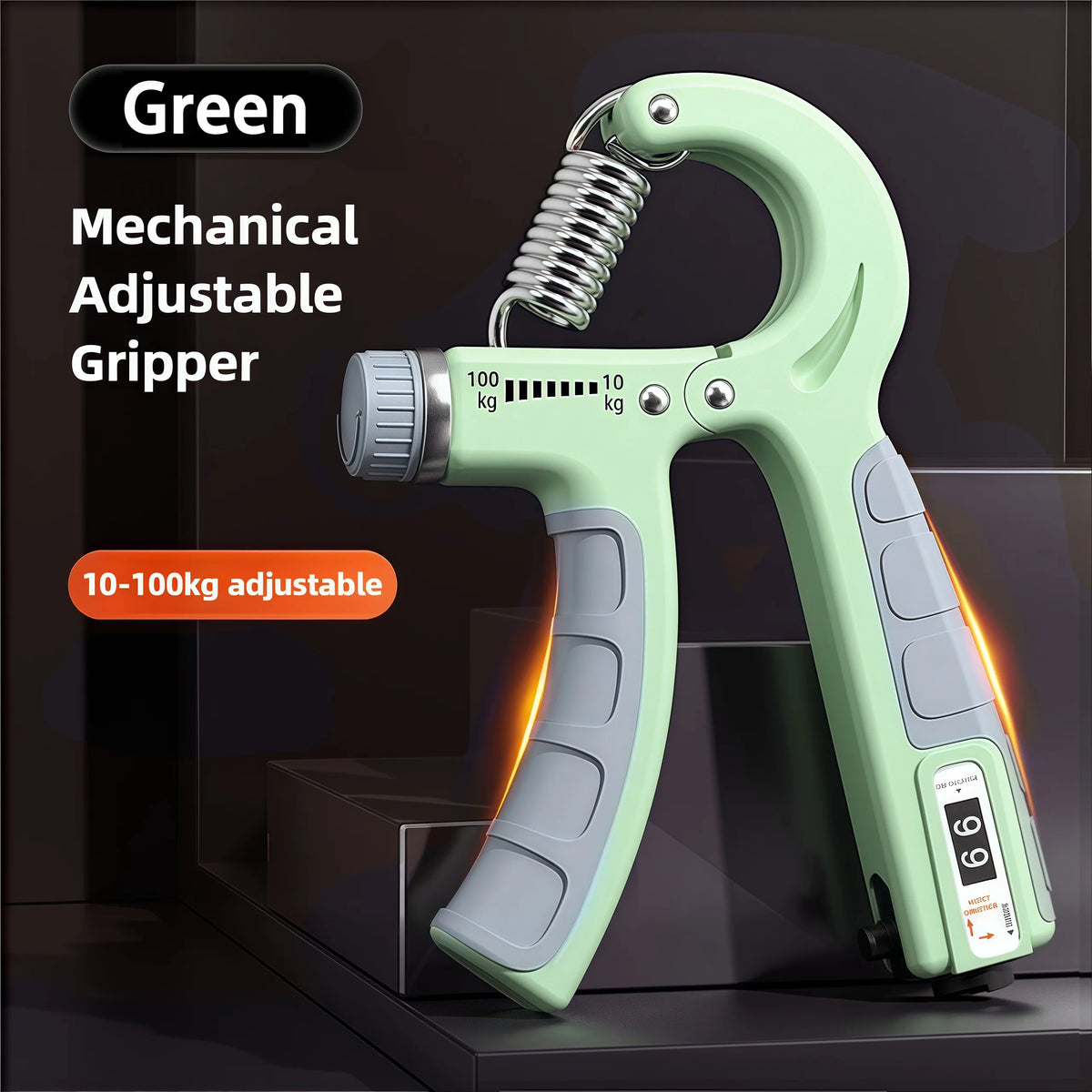 A green mechanical adjustable gripper hand strengthener with a coiled spring and weight markings is shown on a dark surface.