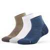 A stack of four breathable performance running socks in shades of beige, white, and navy blue.