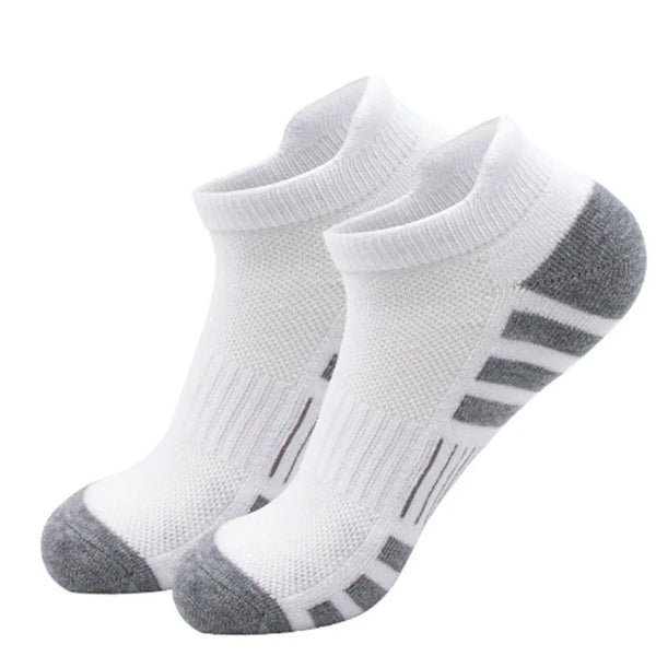 A pair of white and gray ankle athletic running socks shown from above.