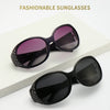 A pair of black sunglasses with diamond-inlaid detailing displayed on a white surface.
