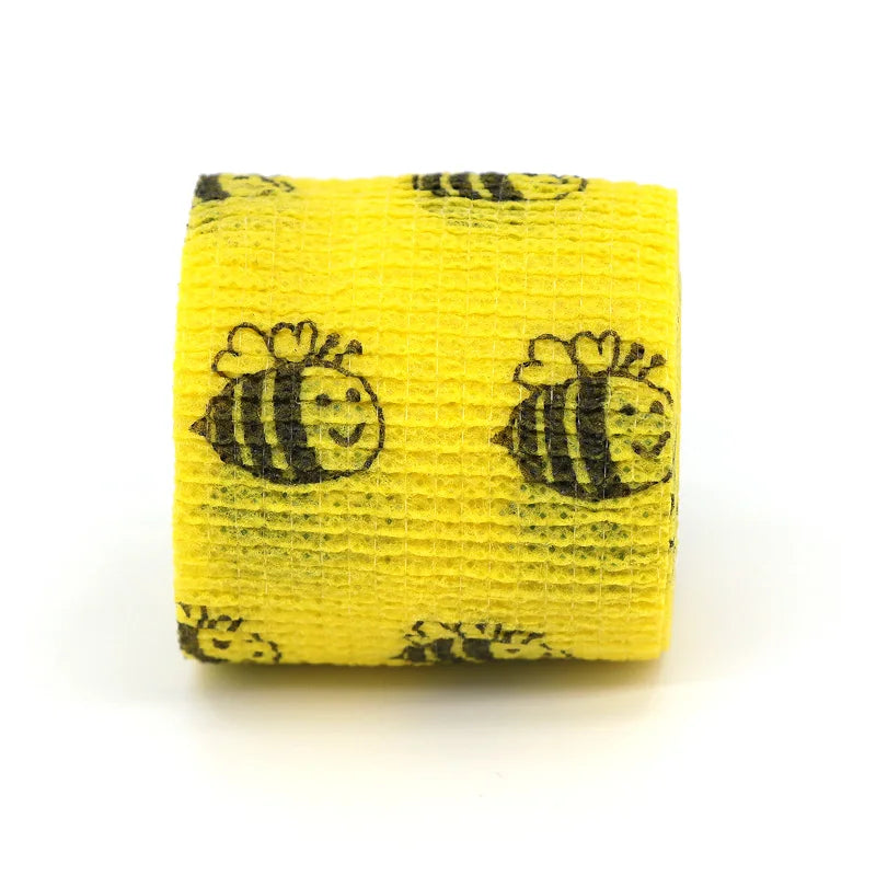 Yellow elastic bandage tape with a black bee pattern.