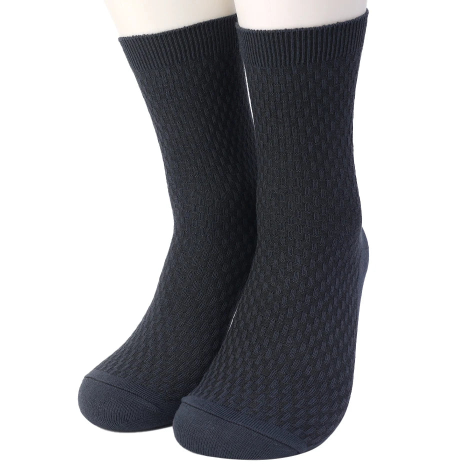 A pair of dark navy bamboo fibre anti-odor socks shown vertically.